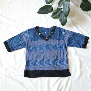 Blue boho blouse with black trim and studs